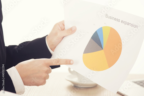 Business people with charts photo