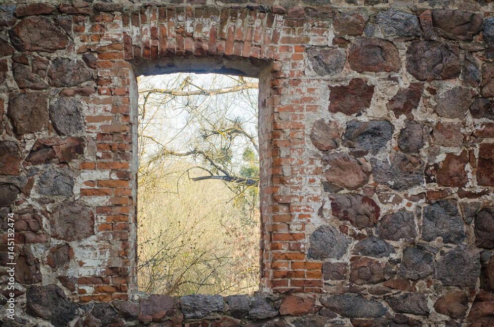 old ruined stone building with a hole in the wall old ruined stone building with a hole in the wall