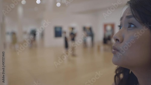 woman visiting art gallery