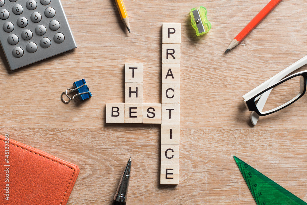 Conceptual keywords on wooden table with elements of game making crossword Conceptual keywords on wooden table with elements of game making crossword