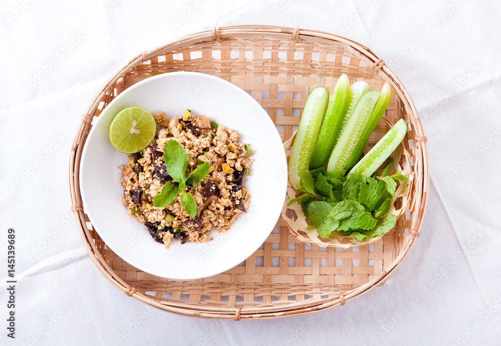Ground pork salad with fresh vegetable and lemon, Traditional Thai food, selective focus