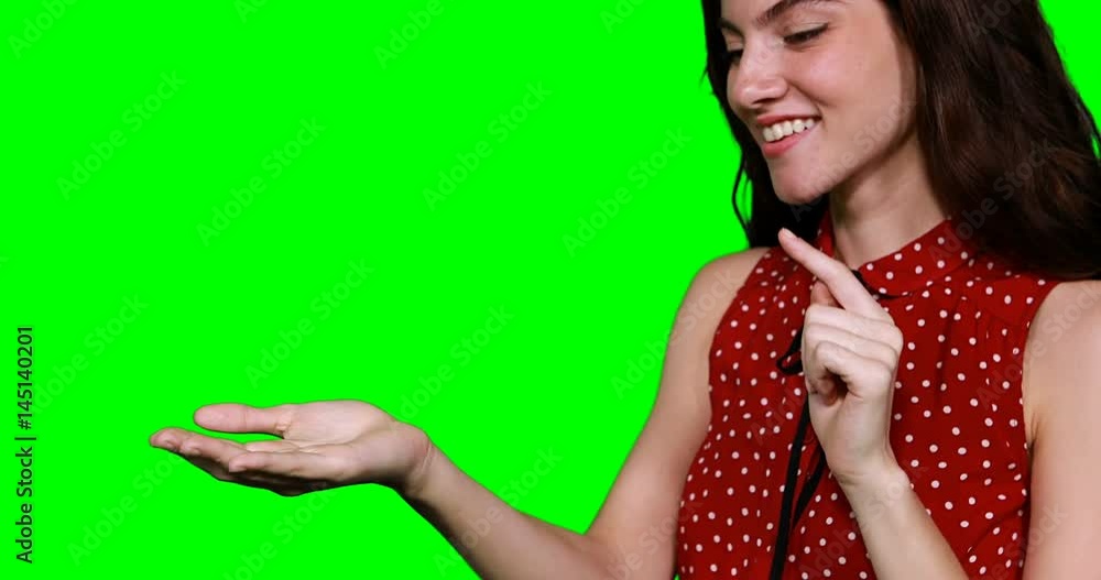 Woman pretending to touch digital screen Woman pretending to touch digital screen