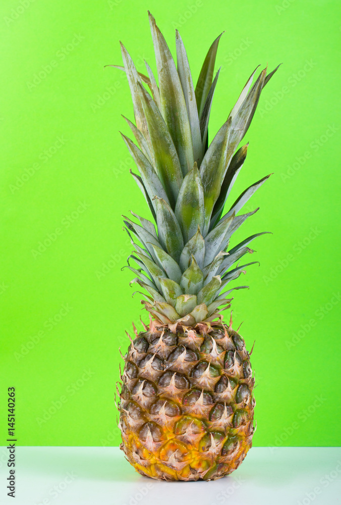 Fototapeta premium Pineapple on a bright background