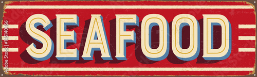 Vintage metal sign - Seafood- Vector EPS10. Grunge and rusty effects can be easily removed for a cleaner look.