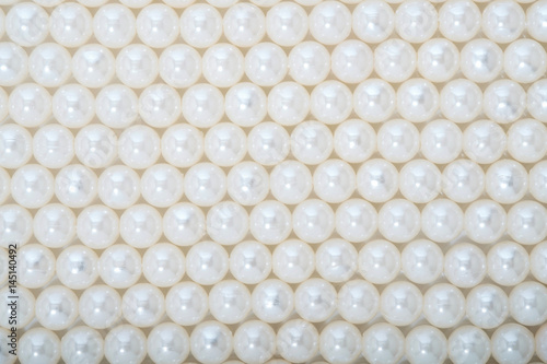 Bead necklace / Abstract background of plastic white bead necklace.