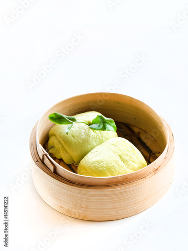 Chinese Steamed Buns on white background, from green tea