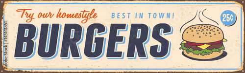 Vintage Metal Sign - Try Our Homestyle Hamburgers - Vector EPS10. Grunge effects can be easily removed for a brand new, clean design.