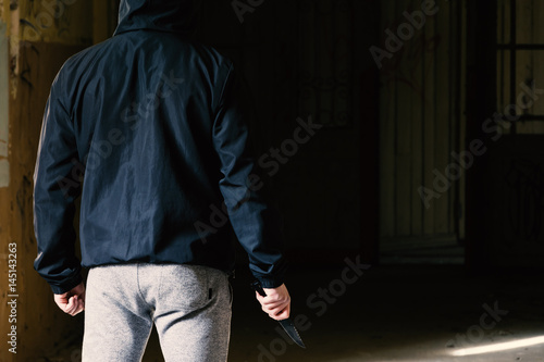 Man in the hood with Knife Crime
