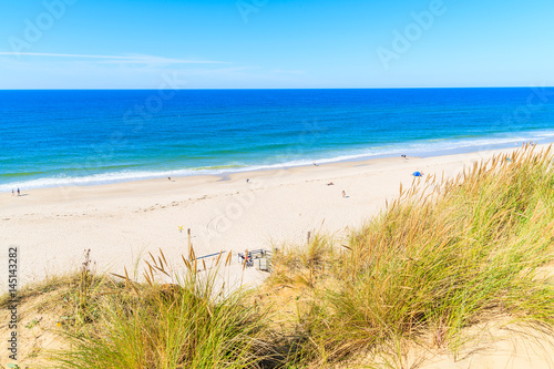 Grass sand dune and view of Kampen beach  Sylt island  Germany