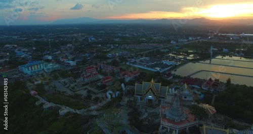 aerial photography during sunset at the beautiful palace on hilltop beside the ocean in Prajuab kirikhan photo