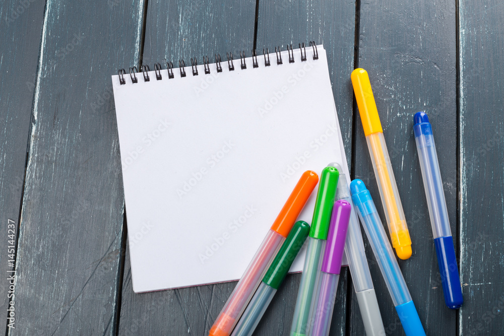 clean sheets on table with markers clean sheets on table with markers