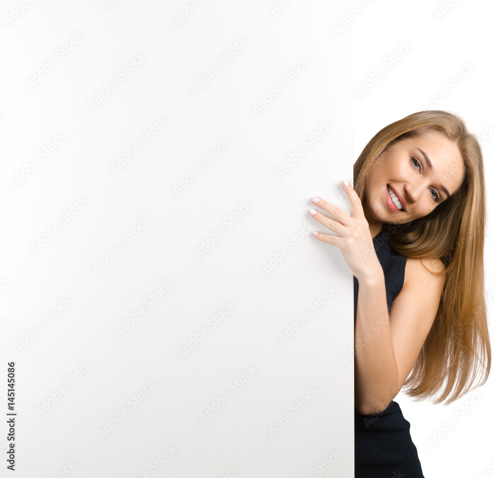 Woman smiling showing white blank sign billboard Woman smiling showing white blank sign billboard