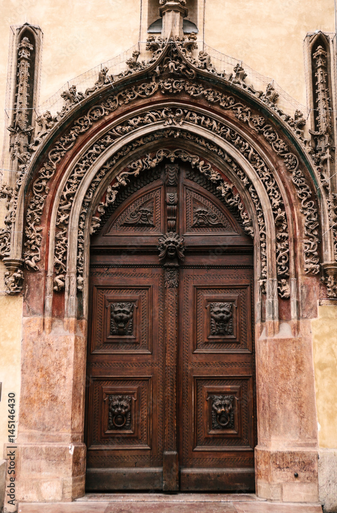 Decorative wooden doors at the old town hall in Prague