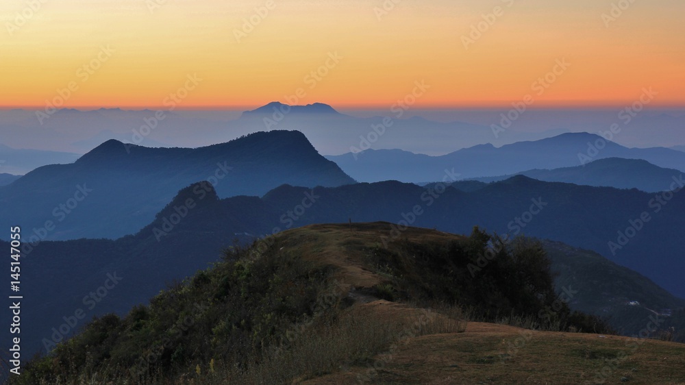 Hills and valleys in Nepal just before sunrise. View from Ghale Gaun, Nepal.