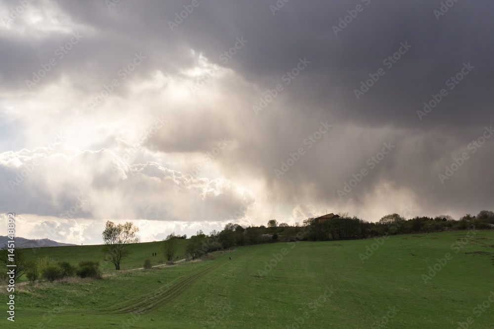 Dramatic clouds, rain in distance. Slovakia