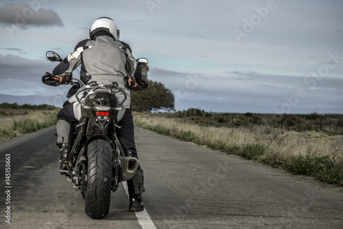 Fototapeta Naklejka Na Ścianę i Meble -  Rider on Motorbike ready to ride