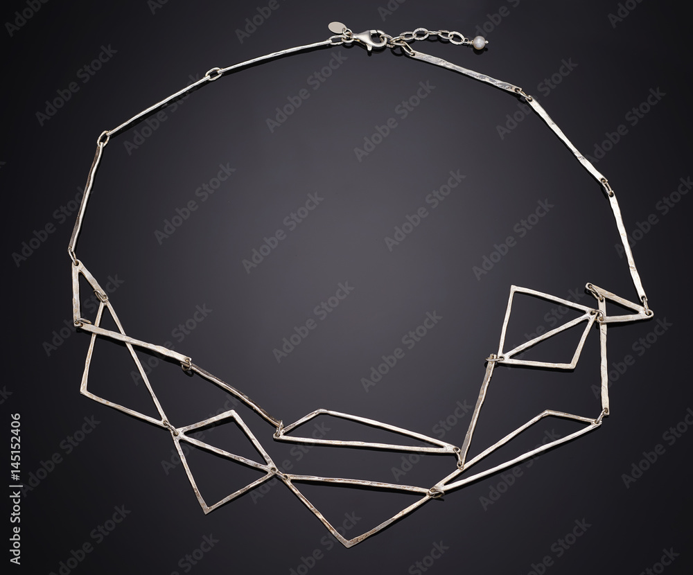 Golden necklace with isolated on black Golden necklace with isolated on black