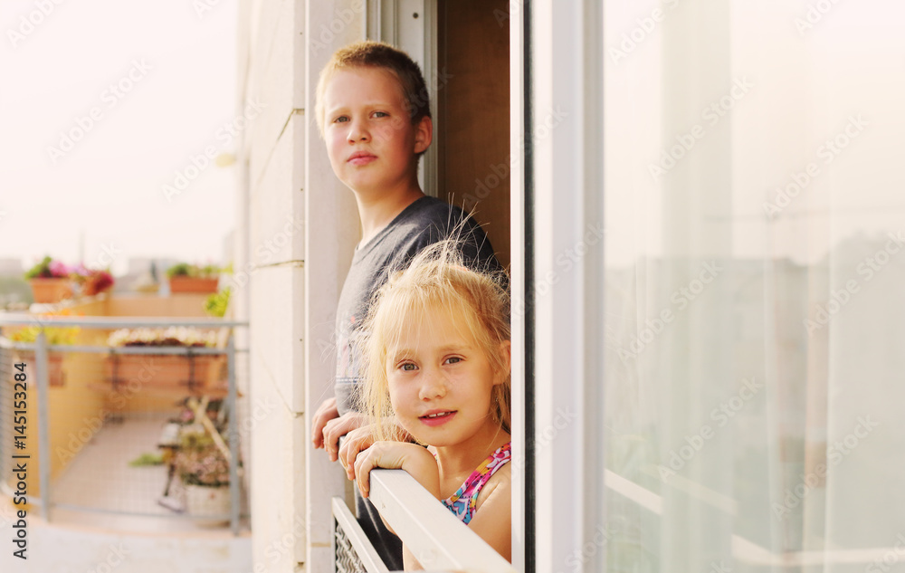 Portrait of autistic 9 years old boy with his 6 years old sister Portrait of autistic 9 years old boy with his 6 years old sister