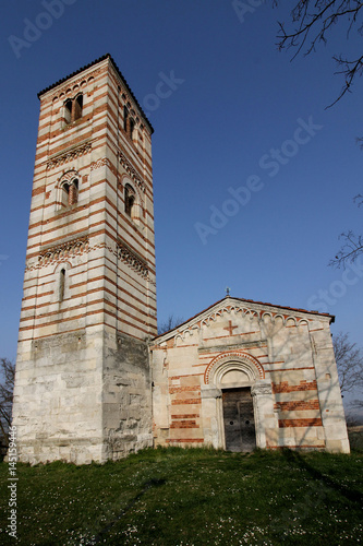 chiesa romanica dei Santi Nazario e Celso a Montechiaro d'Asti; la facciata e il campanile photo