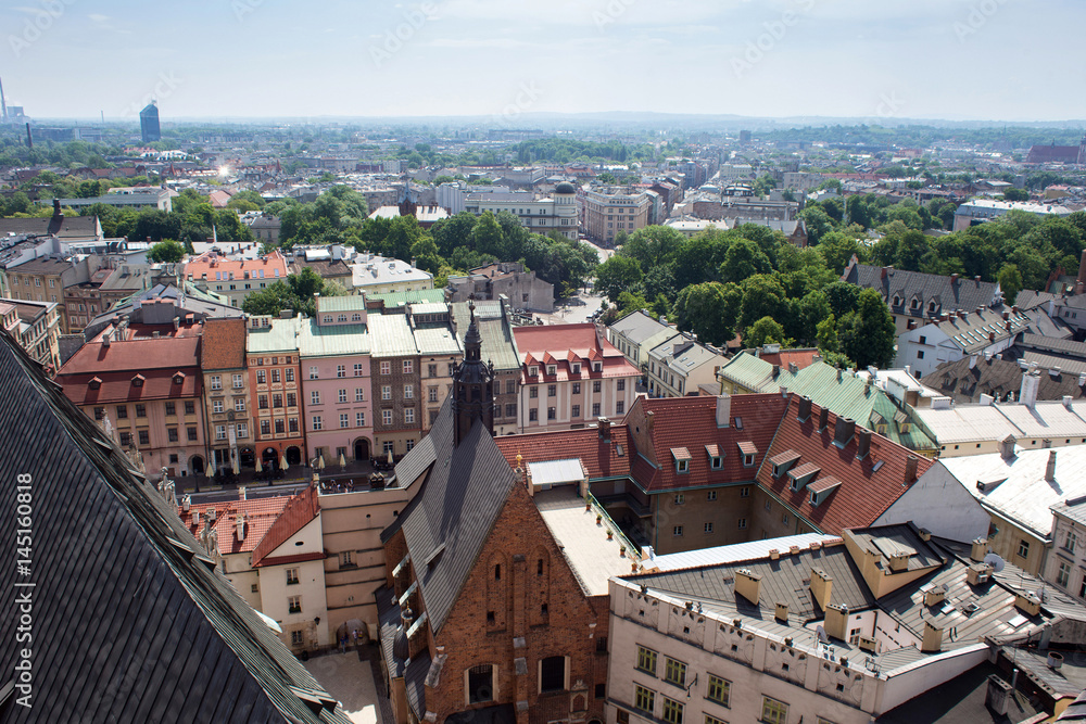 Aerial view of the Cathedral of St. Barbara and the Jesuit Monastery, and other roofs of houses in the historic part of Krakow. Poland.