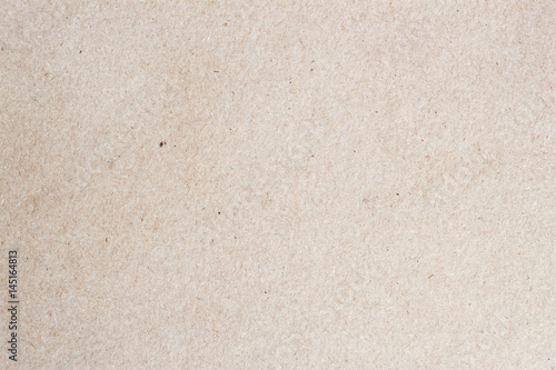 Paper texture cardboard background for design with copy space text or image. Recyclable material that looks virtually identical to the plain , but has small inclusions of cellulose