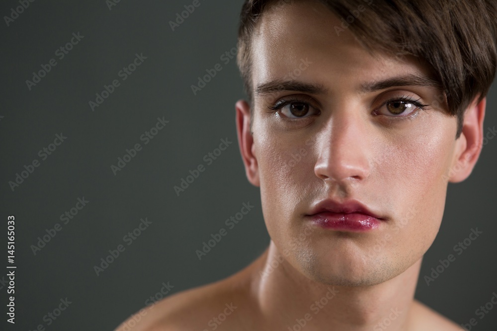 Obraz premium Shirtless androgynous man looking at camera
