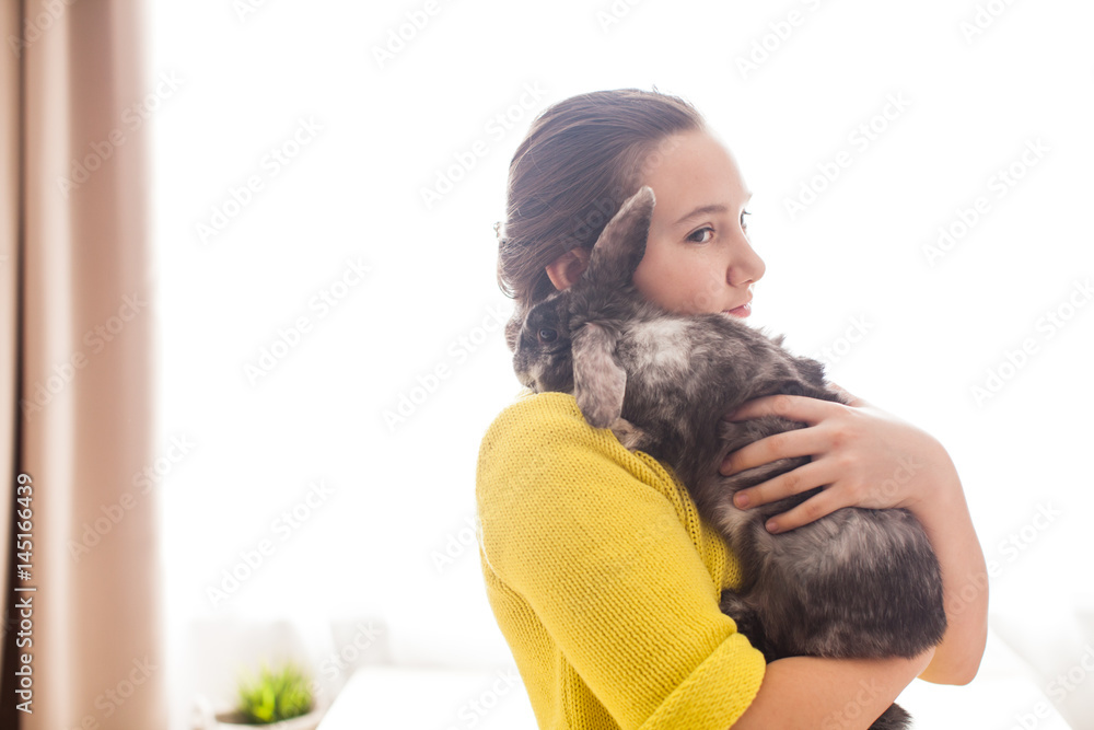 Girl with her favorite pet Girl with her favorite pet