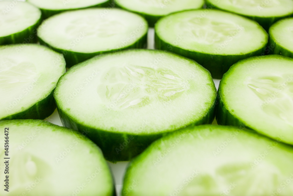 fresh juicy slice cucumber on a white background, isolated fresh juicy slice cucumber on a white background, isolated