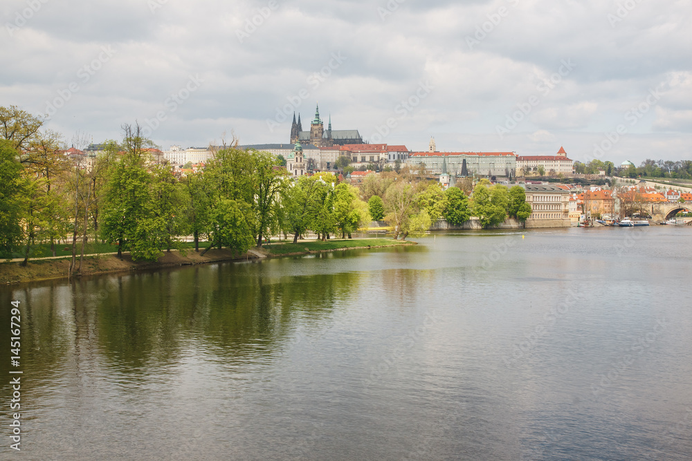 Czech Republic, Prague. View of castle with river Vltava