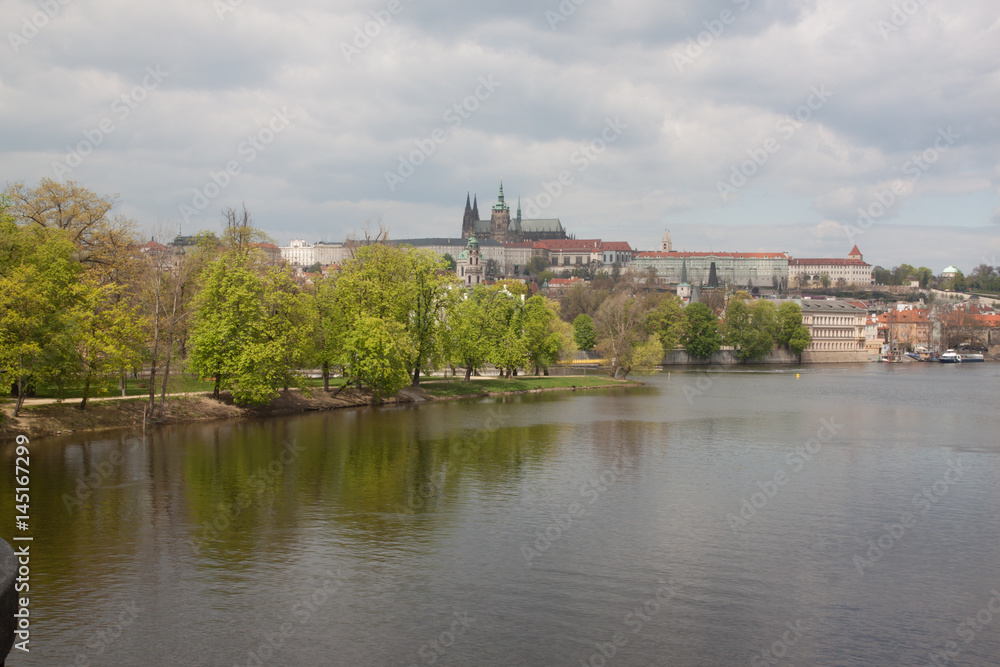 Czech Republic, Prague. View of castle with river Vltava