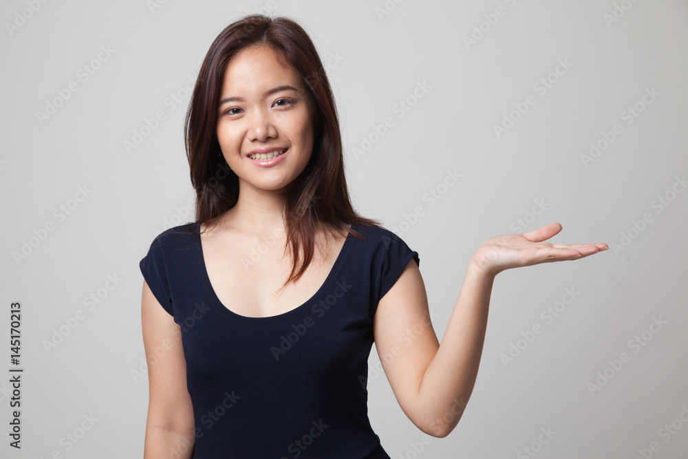 Beautiful young Asian woman show palm hand. Beautiful young Asian woman show palm hand.