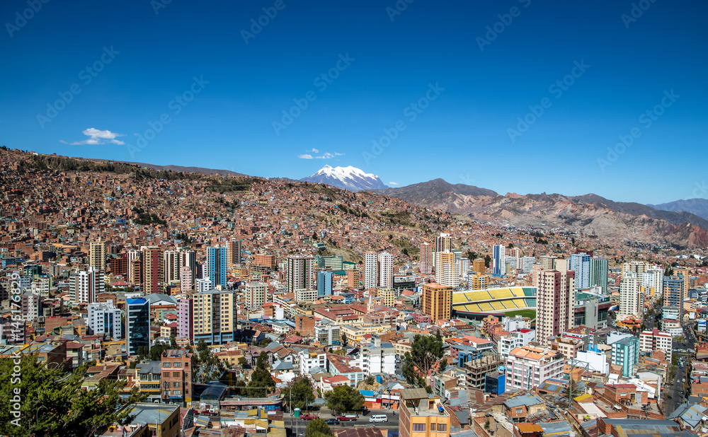 Aerial view of La Paz with Illimani Mountain on background - La Paz, Bolivia
