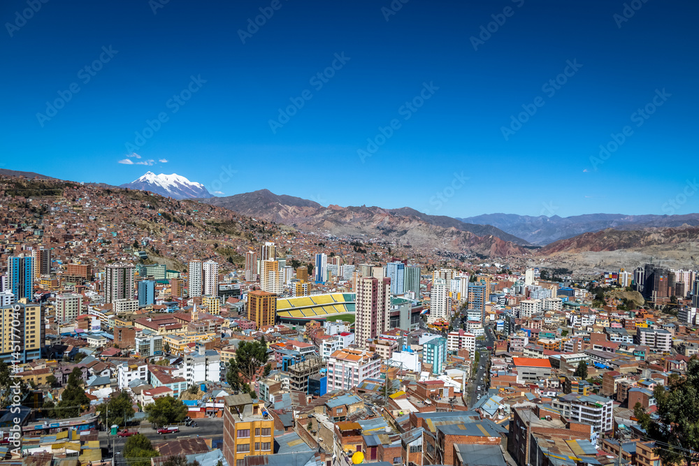 Aerial view of La Paz with Illimani Mountain on background - La Paz, Bolivia