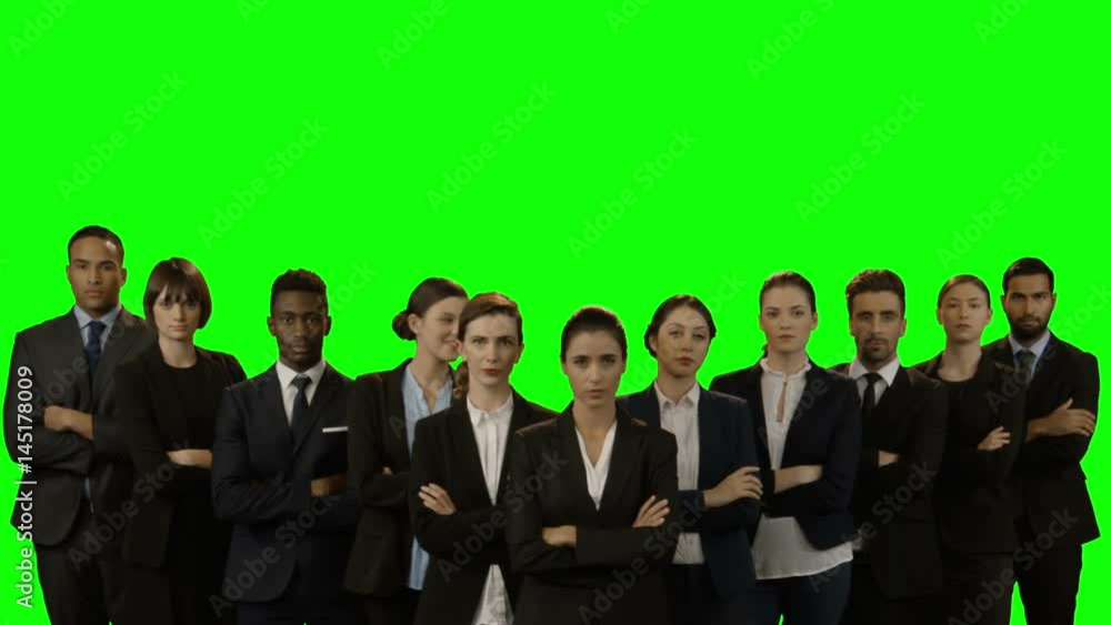 Team of businesspeople standing with arms crossed Team of businesspeople standing with arms crossed