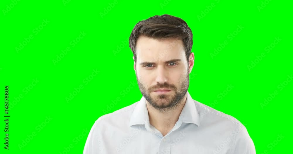 Worried man standing against green screen Worried man standing against green screen
