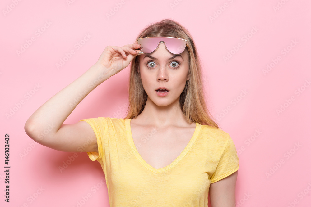 Woman shocked face with open mouth and big eyes. Woman shocked face with open mouth and big eyes.
