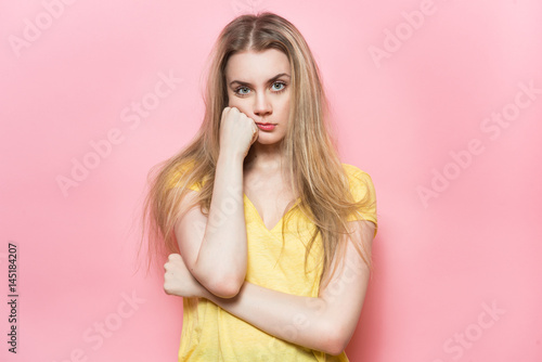 Young bored emotional woman thinking about relationships