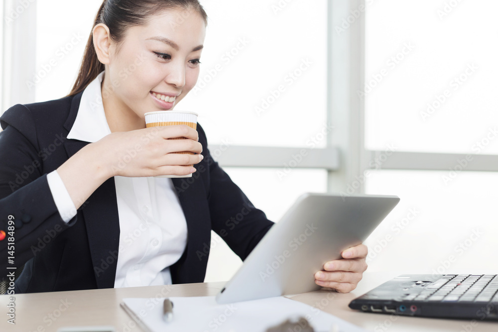 young asian businesswoman in modern office young asian businesswoman in modern office