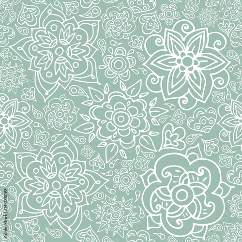Floral seamless pattern with doodle flowers and leaves.Vector hand drawn pattern. Seamless pattern can be used for wallpapers, pattern fills, web page backgrounds, coloring book page. 
