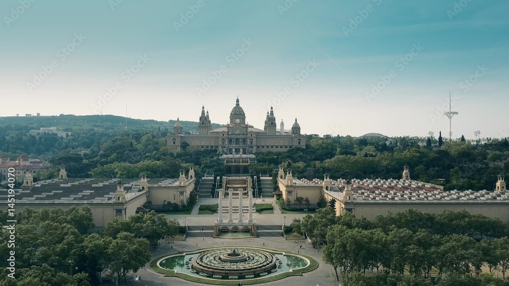 Aerial rising shot of Palau Nacional - National Palace museum in Barcelona, Spain