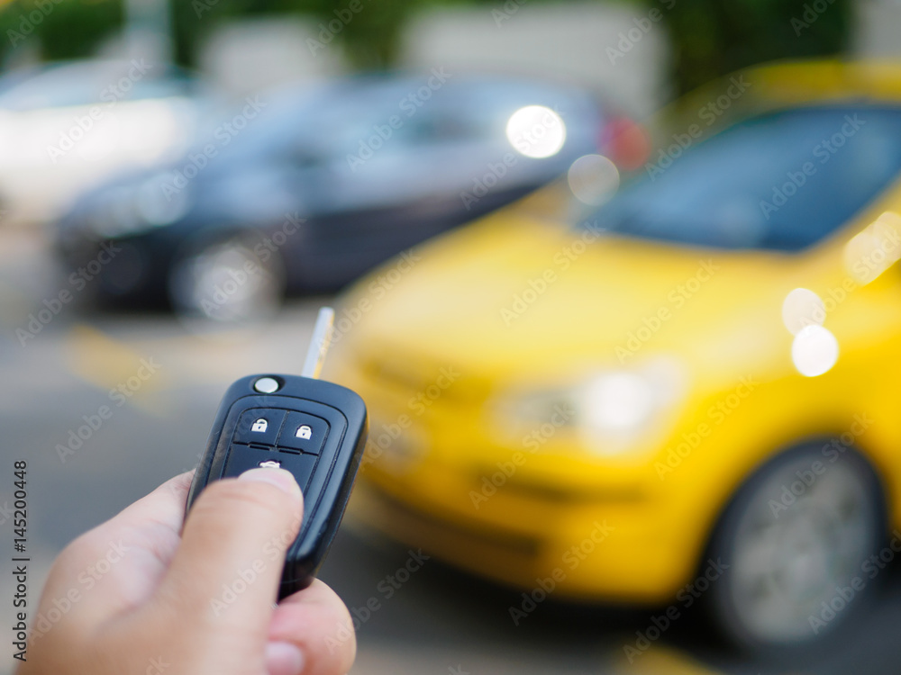 hand presses on the remote control car alarm systems hand presses on the remote control car alarm systems