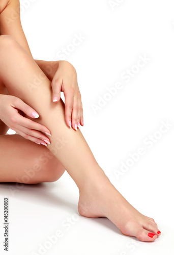 Woman s legs on white background  isolated