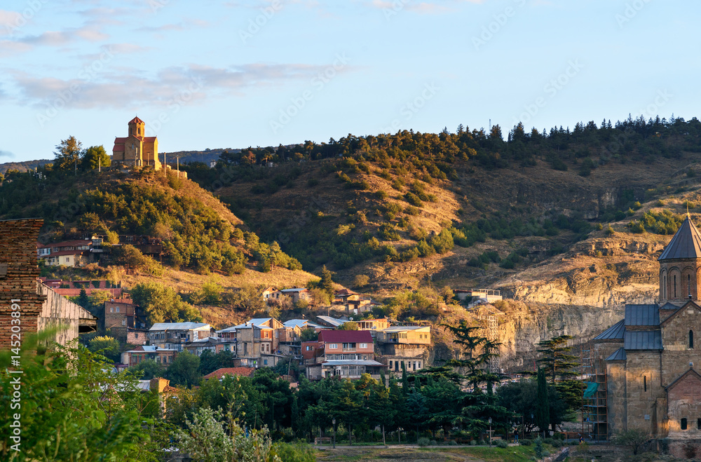 View of old city and Tabor Monastery at sunset. Tbilisi, Georgia