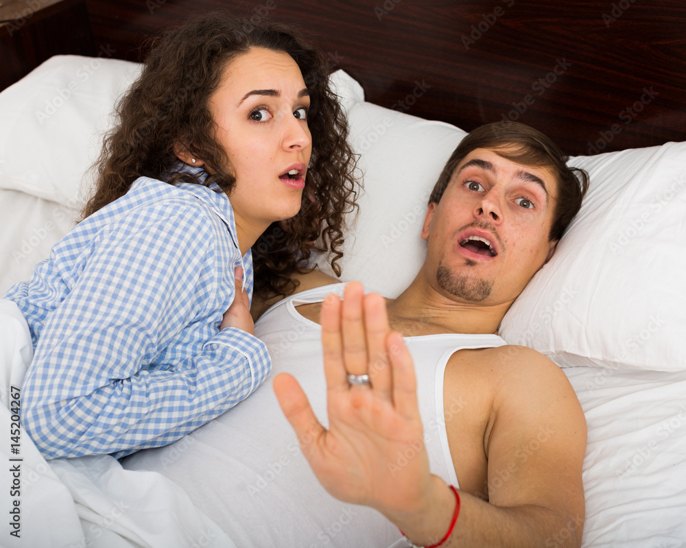 Young adults caught having sex in bed Stock Photo Adobe Stock pic