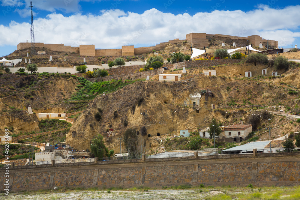 Dwellings houses into rock at Puerto Lumbreras and castle