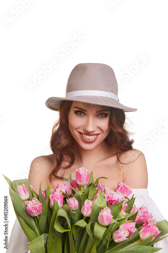 Woman with bouquet of tulips isolated over white background © ZoomTeam