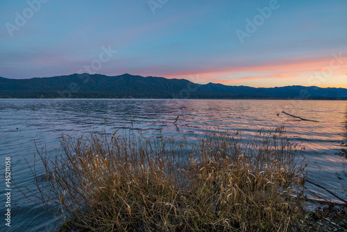 Serene lake view at sunset with the beautiful reflection of the blue sky. HOH RAIN FOREST  Olympic National Park  Washington state  USA