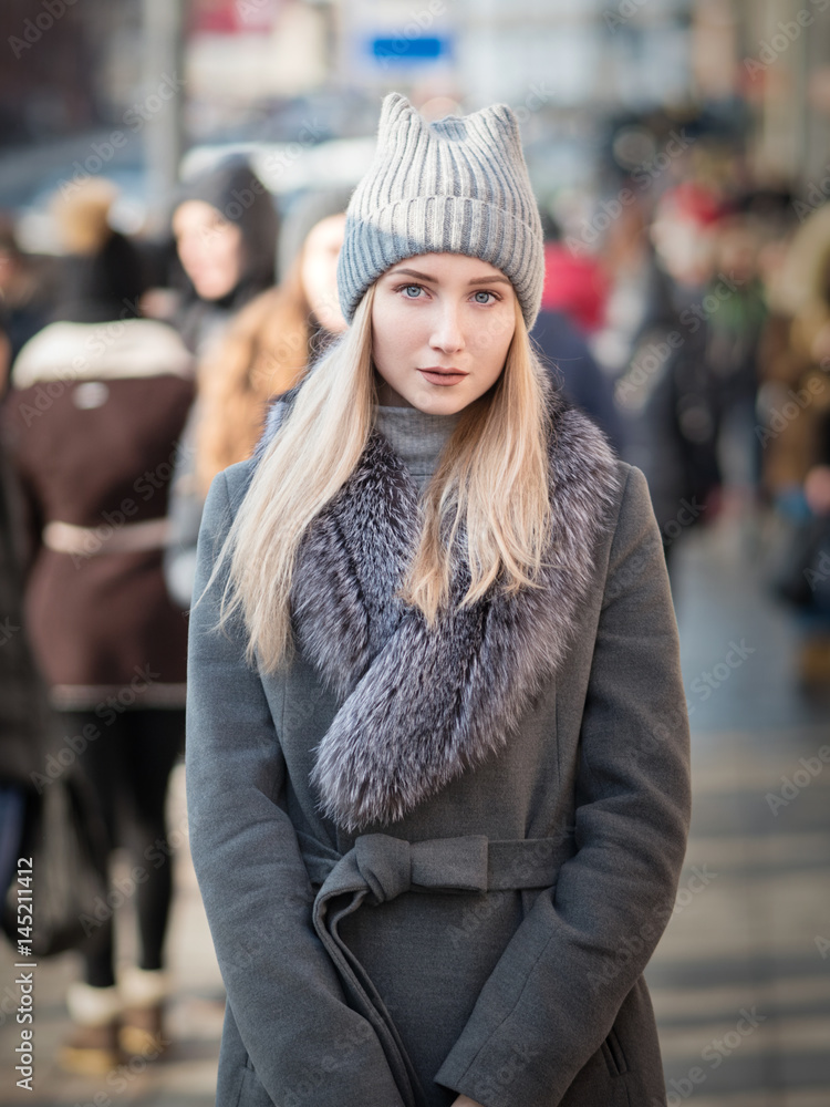 Portrait of young woman at sunny winter day. Portrait of young woman at sunny winter day.