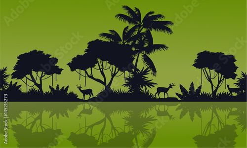 Silhouette of forest reflection on the lake scenery
