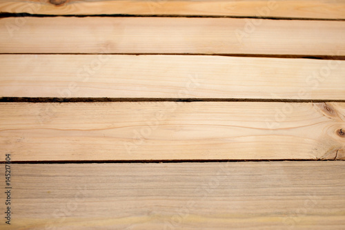 Light natural wooden background of boards. Texture of the table